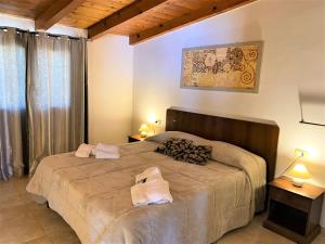 Postel nebo postele na pokoji v ubytování Villa Margherita