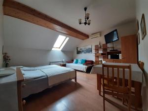 Säng eller sängar i ett rum på Pokoje Gościnne Kalina