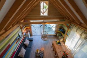 an overhead view of a living room in a tiny house at Sunny Medemblik in Medemblik