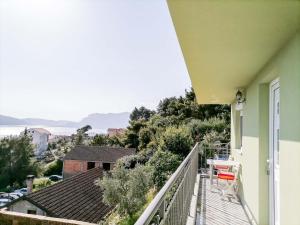 a balcony of a house with a view at Apartments Siesta in Tivat