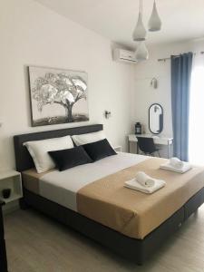 Ένα ή περισσότερα κρεβάτια σε δωμάτιο στο Villa Franko Baška Voda
