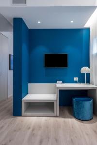 TV a/nebo společenská místnost v ubytování Hotel Orient & Pacific