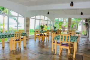 Restoranas ar kita vieta pavalgyti apgyvendinimo įstaigoje Palm garden Resort