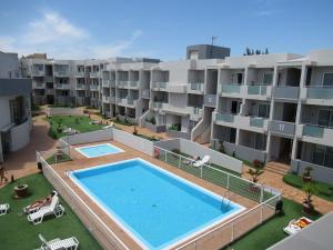 The swimming pool at or close to La Rosita Sun Apartments, by Comfortable Luxury