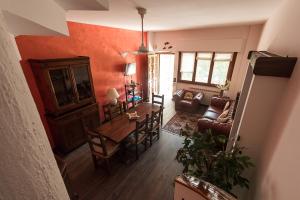 an overhead view of a living room with a table and chairs at VILLA IARA in Cerveteri