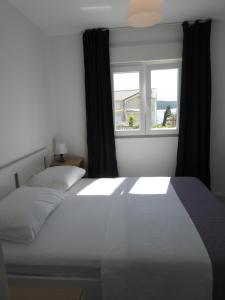 Postel nebo postele na pokoji v ubytování Apartment Salvia