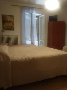 Postel nebo postele na pokoji v ubytování B&B Iris