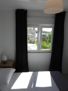 Postel nebo postele na pokoji v ubytování Apartment Salvia