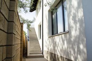 a staircase leading up to a building with windows at SEALEO in Gribovka