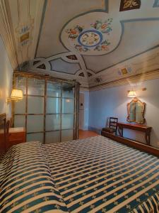 Ein Bett oder Betten in einem Zimmer der Unterkunft Dimora Sessanio