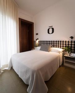 Postel nebo postele na pokoji v ubytování Hotel Aplo - Breakfast Experience + 37 fotografií