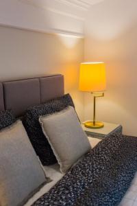 Łóżko lub łóżka w pokoju w obiekcie Apartamenty Świnoujście - Armii Krajowej 11