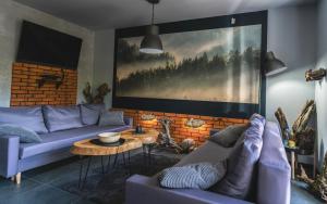 Część wypoczynkowa w obiekcie Apartamenty SPOKOLOKO Skrzyczne Residence Korzenny i Kamienny