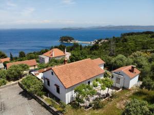 an aerial view of a house with the ocean at Olive Garden Accomodation in Savar