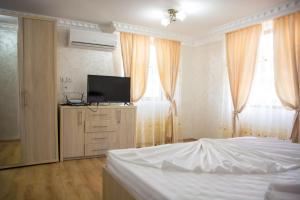 TV a/nebo společenská místnost v ubytování CASA ALEX SI ALEXIA