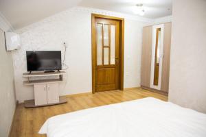 TV a/nebo společenská místnost v ubytování CASA ALEX SI ALEXIA + 21 fotografií