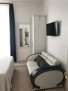 TV a/nebo společenská místnost v ubytování B&B Nike - Rooms Only