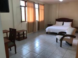 Postel nebo postele na pokoji v ubytování Hosteria Shell