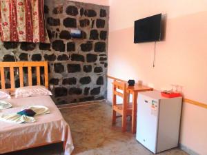 TV a/nebo společenská místnost v ubytování Pousada Villa Concetta