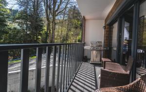 Balkon lub taras w obiekcie Apartamenty SPOKOLOKO Skrzyczne Residence Korzenny i Kamienny