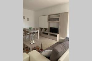 Lario Promenade: family friendly apartment in Como tesisinde bir oturma alanı