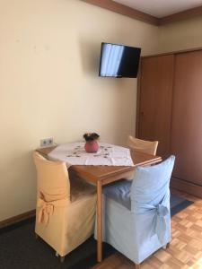 Televízia a/alebo spoločenská miestnosť v ubytovaní Apartments by Haus Ingrid