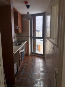Kuchyň nebo kuchyňský kout v ubytování Apartamentos Las Margas Golf Formigal Ordesa