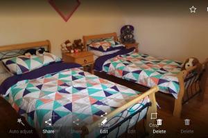 Letto o letti in una camera di Annies Meadow.