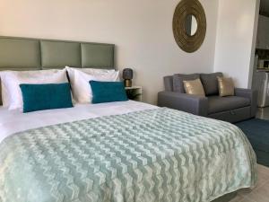 Ένα ή περισσότερα κρεβάτια σε δωμάτιο στο Seaside Luxury Apartment - Praia da Rocha
