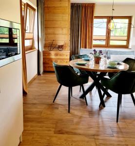Kuchyňa alebo kuchynka v ubytovaní Apartamenty widokowe U Homera