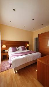 Ένα ή περισσότερα κρεβάτια σε δωμάτιο στο Apartments Miljas