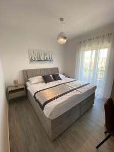Postel nebo postele na pokoji v ubytování Villa Tragurium