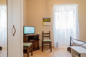 A television and/or entertainment centre at Agliata 138