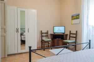 A television and/or entertainment centre at Agliata 138