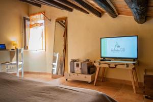A television and/or entertainment centre at Agliata 138