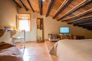 A bed or beds in a room at Agliata 138