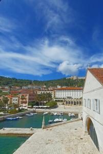 a view of a harbor with boats in the water at Apartment Lilly with Amazing City View in Hvar