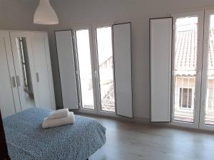 Posteľ alebo postele v izbe v ubytovaní Piso Calle Real Pontevedra