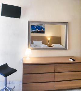 A television and/or entertainment centre at Jimmy's rooms nea potidea