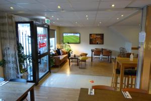 Зона вітальні в Pizza House Bed Simrishamn
