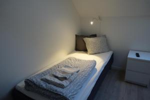 Ліжко або ліжка в номері Pizza House Bed Simrishamn