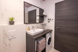 Kuchyň nebo kuchyňský kout v ubytování Pr `Agotnik Apartments & Rooms Bohinj + 37 fotografií