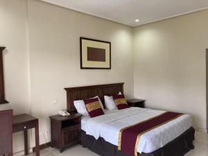 Letto o letti in una camera di Dago Highland Resort