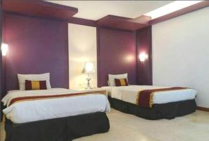 Letto o letti in una camera di Dago Highland Resort