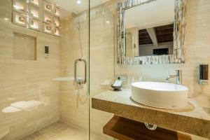 Koupelna v ubytování Pandawa All Suites Hotel