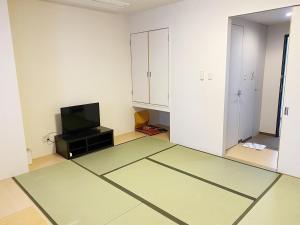 TV a/nebo společenská místnost v ubytování Smile Hotel Kitaasaka