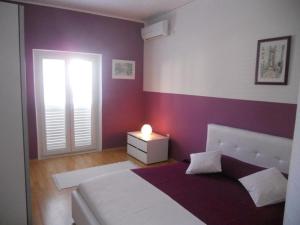 Postel nebo postele na pokoji v ubytování Apartment in Korcula with sea view, terrace, air conditioning, Wi-Fi (4695-1)