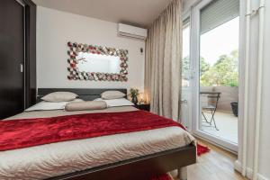Posteľ alebo postele v izbe v ubytovaní Marina Yacht Apartment