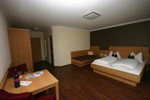 Ліжко або ліжка в номері Hotel Herzblut - Joker card included in summer