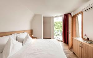 Postel nebo postele na pokoji v ubytování AMELIA apartments + 55 fotografií